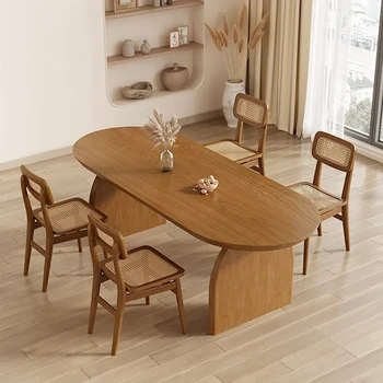 Компактен маса за хранене от масивно дърво в скандинавски овалния стил, маси, в японската хол, комбинация от места за хранене маси и столове